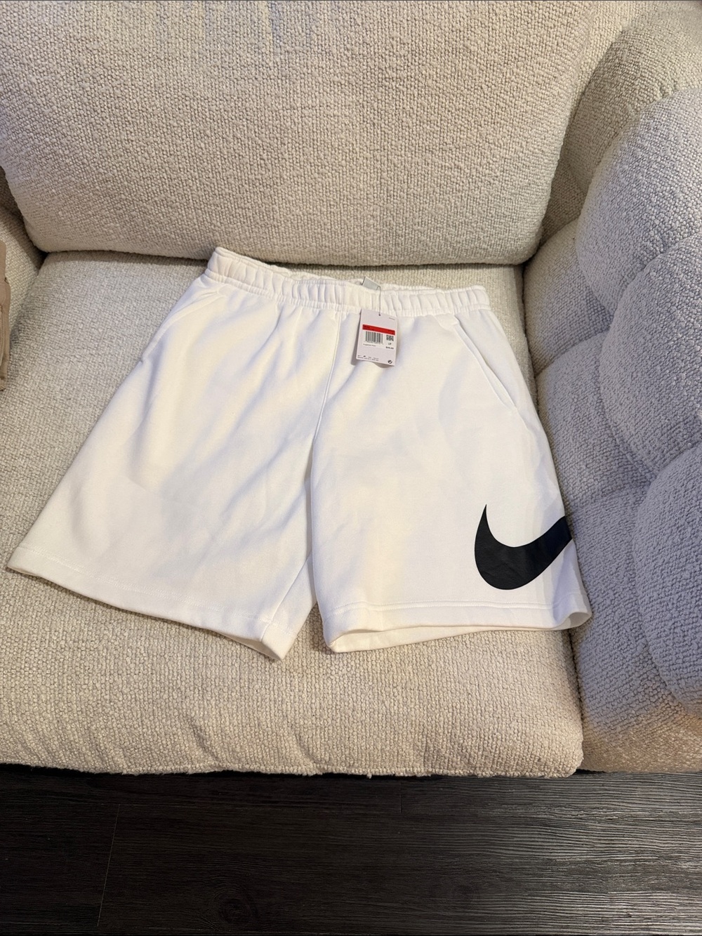 Nike Men’s White Athletic Shorts with Black Swoosh